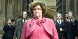 Umbridge standing in Hogwarts