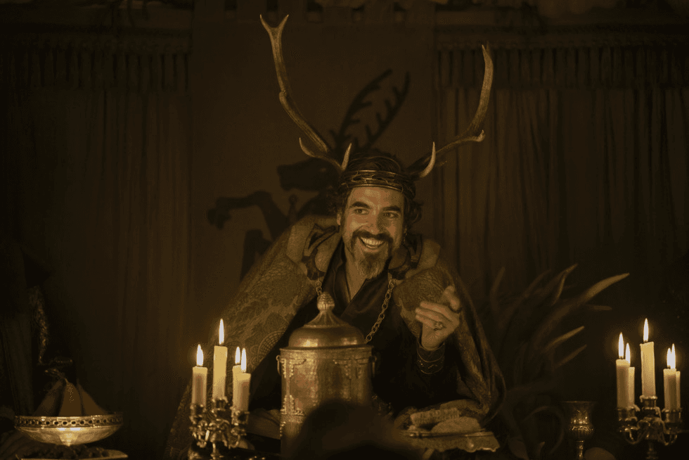 Ser Lyonel Baratheon sitting and laughing