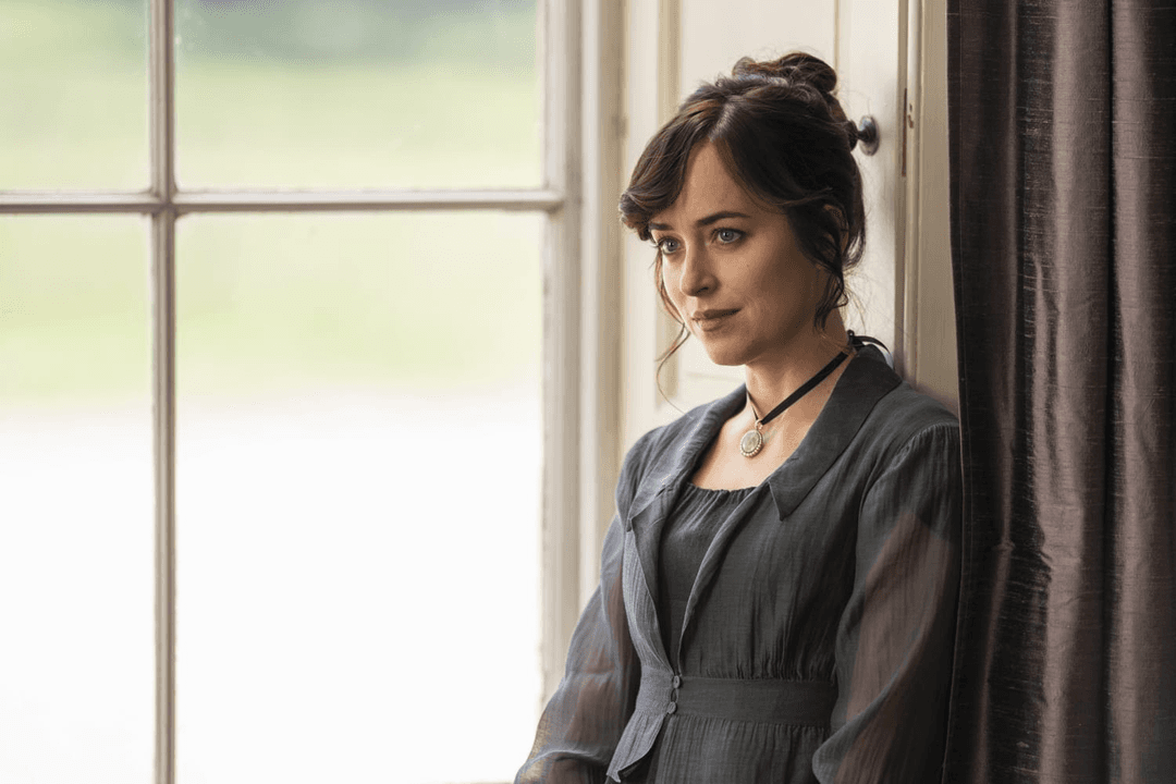 Persuasion film image with Dakota sitting by the window