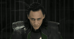 Loki looking slyly and devising a plan