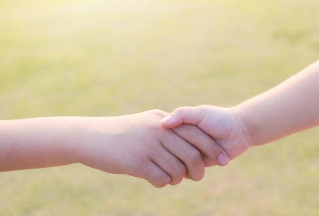 Premium Photo | Sister and brother holding hand in hand at the garden  outdoor. | Outdoor gardens, Outdoor, Holding hands