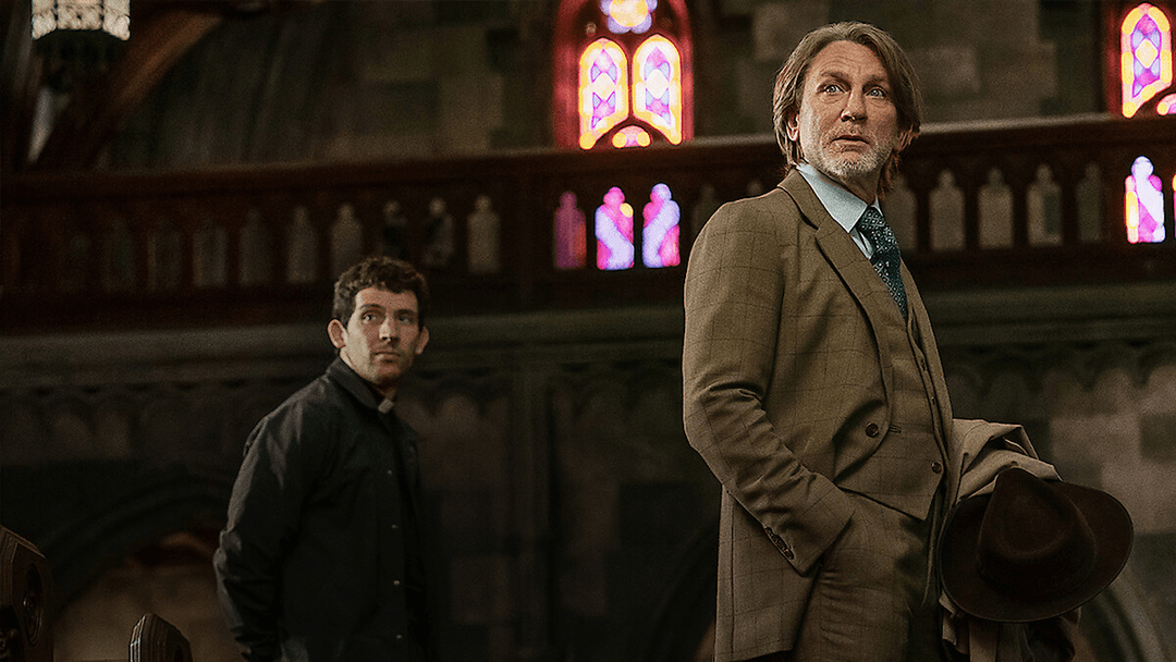 Two men looking back